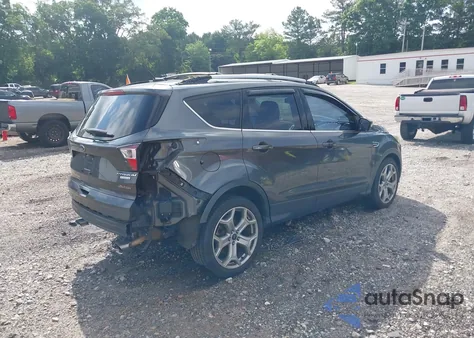 2017 Ford Escape Titanium z USA, uszkodzony, nr VIN 1FMCU0J90HUA19002